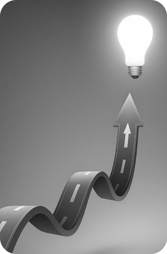 3D roadmap pointing upward to an illuminated lightbulb